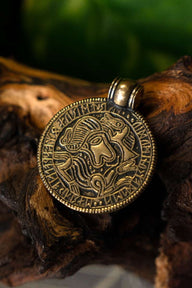 Vendel bracteate amulet Tjurko, bronze