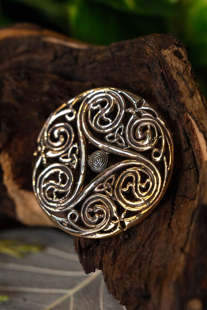 Celtic brooch triskelion, bronze