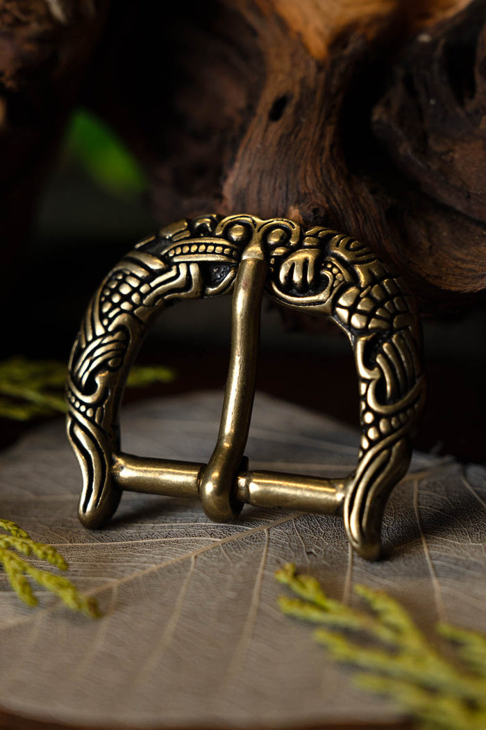 Borre-Jellinge style buckle gripping-beast