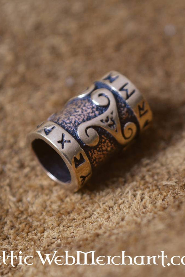 Beard bead with triskelion & runic inscription, bronze