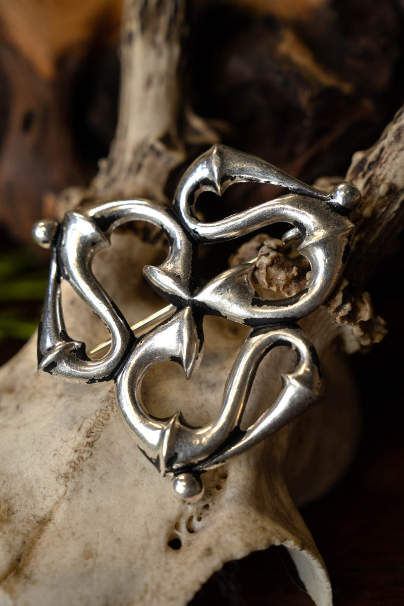 Romersk trumpetfibula, försilvrad brons