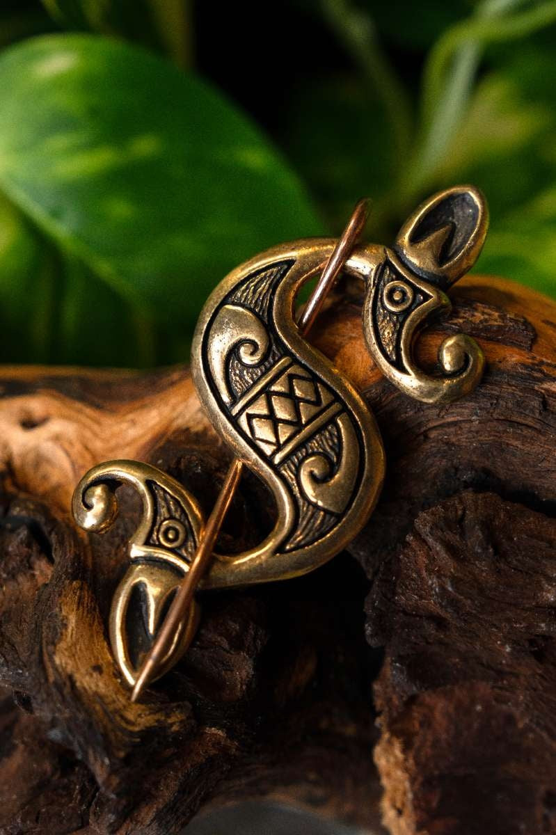 Fíbula galo-romana de caballito de mar, bronce