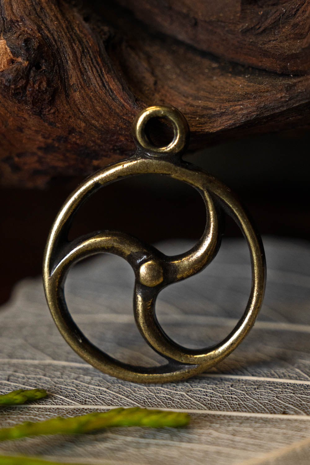 Celtic sun amulet, bronze