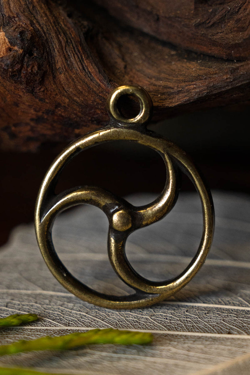 Celtic sun amulet, bronze