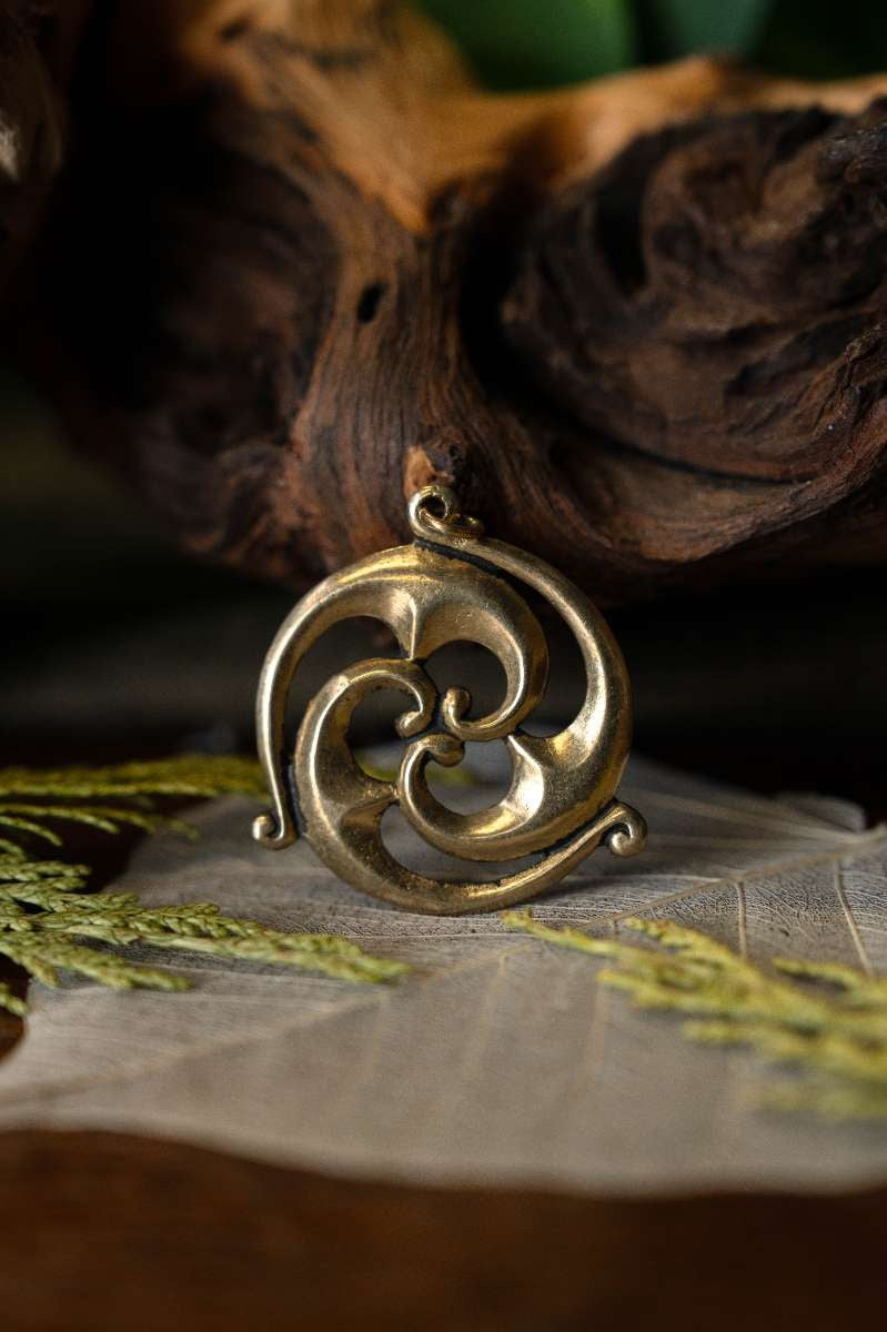 Gallo-Roman solar amulet, bronze