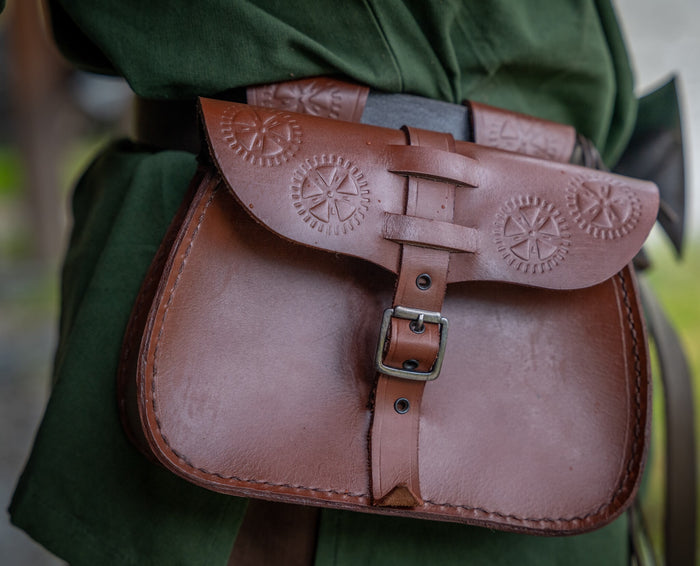 Brown leather bag sun wheel