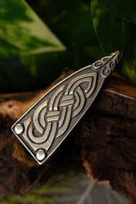 Viking belt end Borre animal, silvered