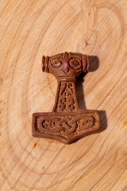 Mjölnir pendant with face, wood