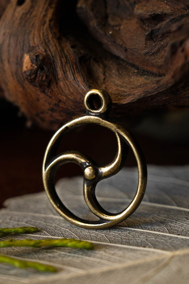 Celtic sun amulet, bronze