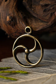Celtic sun amulet, bronze