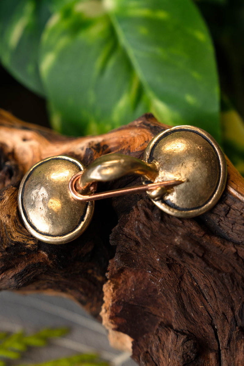 Bronsålders glasögonfibula, brons