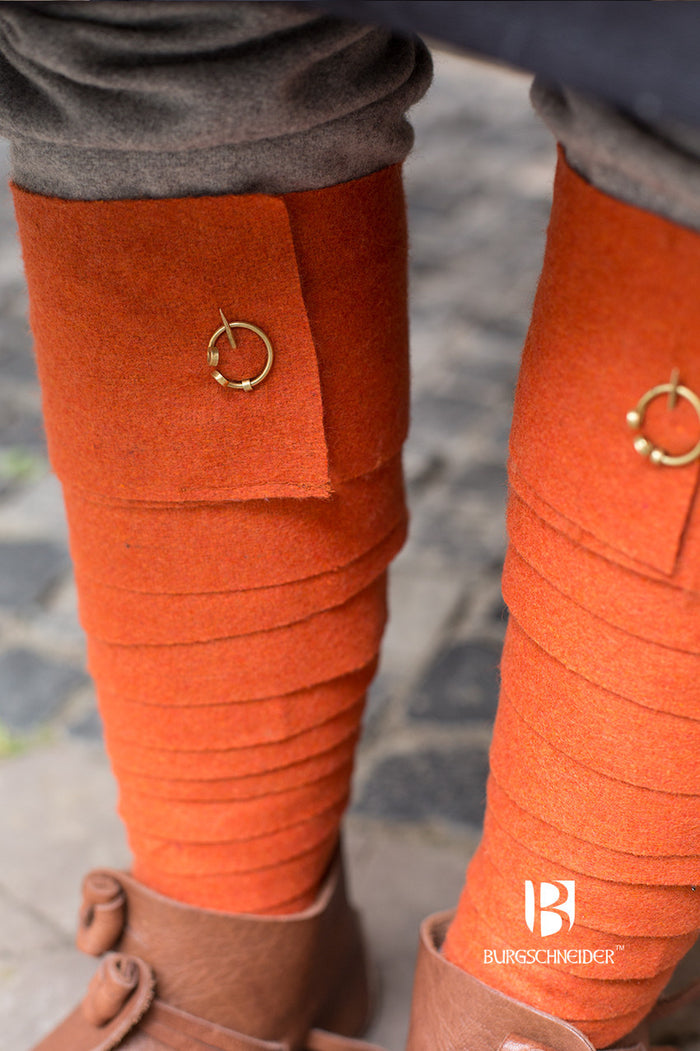 Fibula for leg wrappings, brass, pair