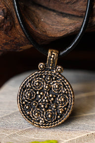 Viking Birka shield amulet, grave 943, bronze