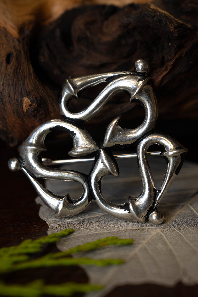 Romersk trumpetfibula, försilvrad brons