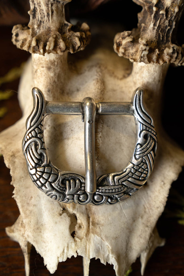 Borre-Jellinge style buckle gripping-beast, silvered