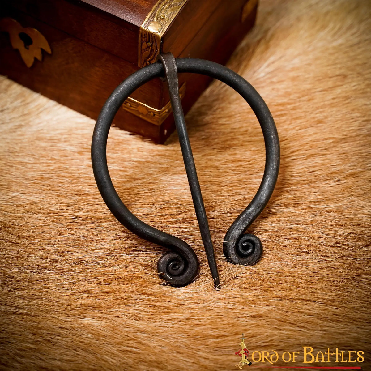 Horseshoe fibula with spirals, iron