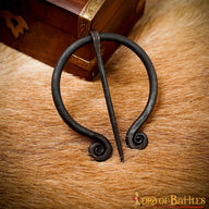 Horseshoe fibula with spirals, iron