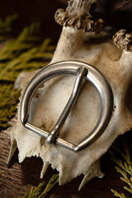 Belt buckle, 16th century, silvered zamak