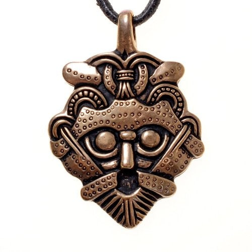 Gnezdovo mask amulet, bronze