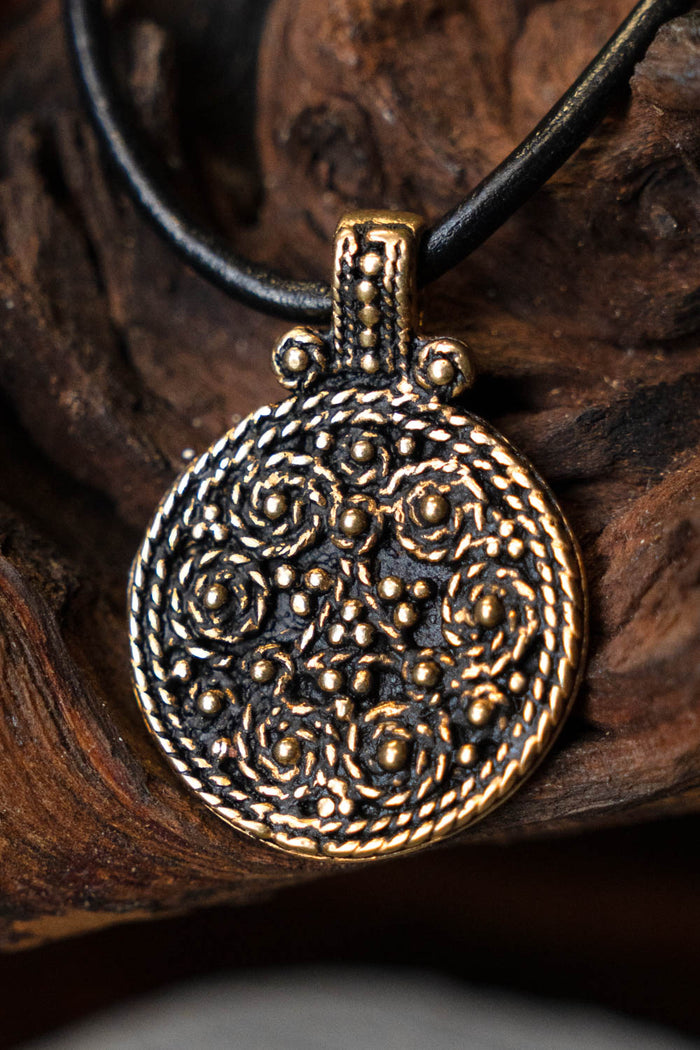 Viking Birka shield amulet, grave 943, bronze