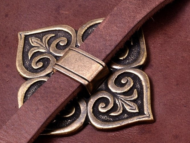 Viking bag strap fitting