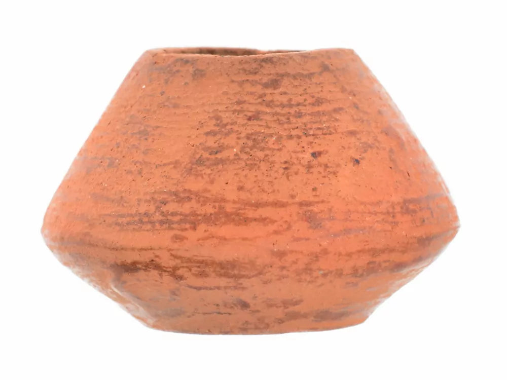 Medieval spinning whorl of clay