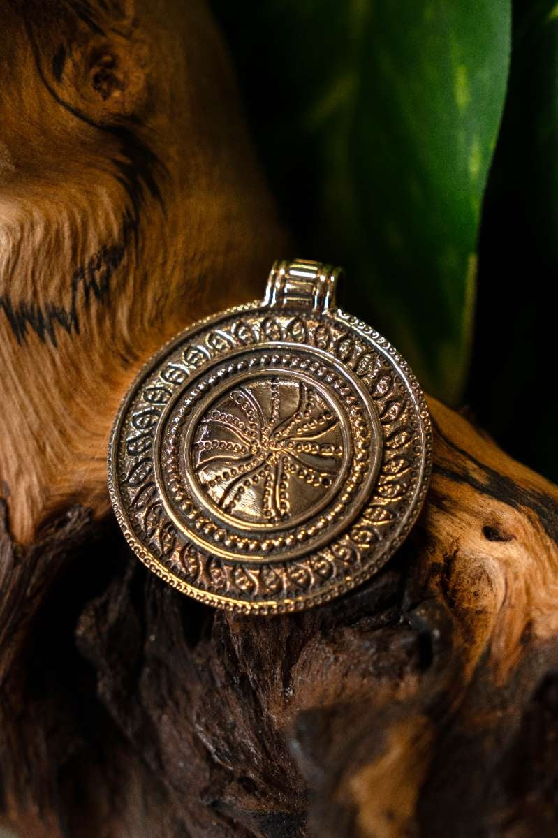 Amulet koła słonecznego, brąz
