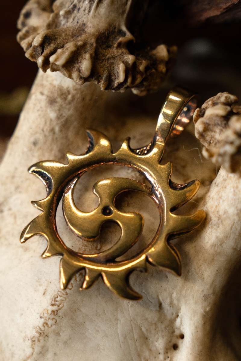 Anhänger Triskelion mit Sonne, Bronze