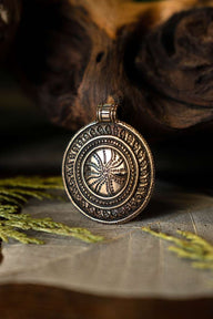 Amulet sun wheel, bronze