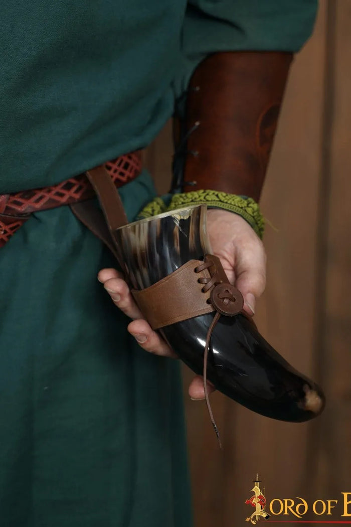 Natural drinking horn with leather holder