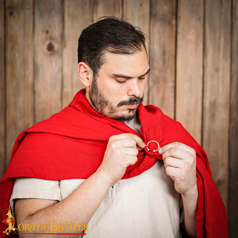 Fíbula de herradura altomedieval, latón