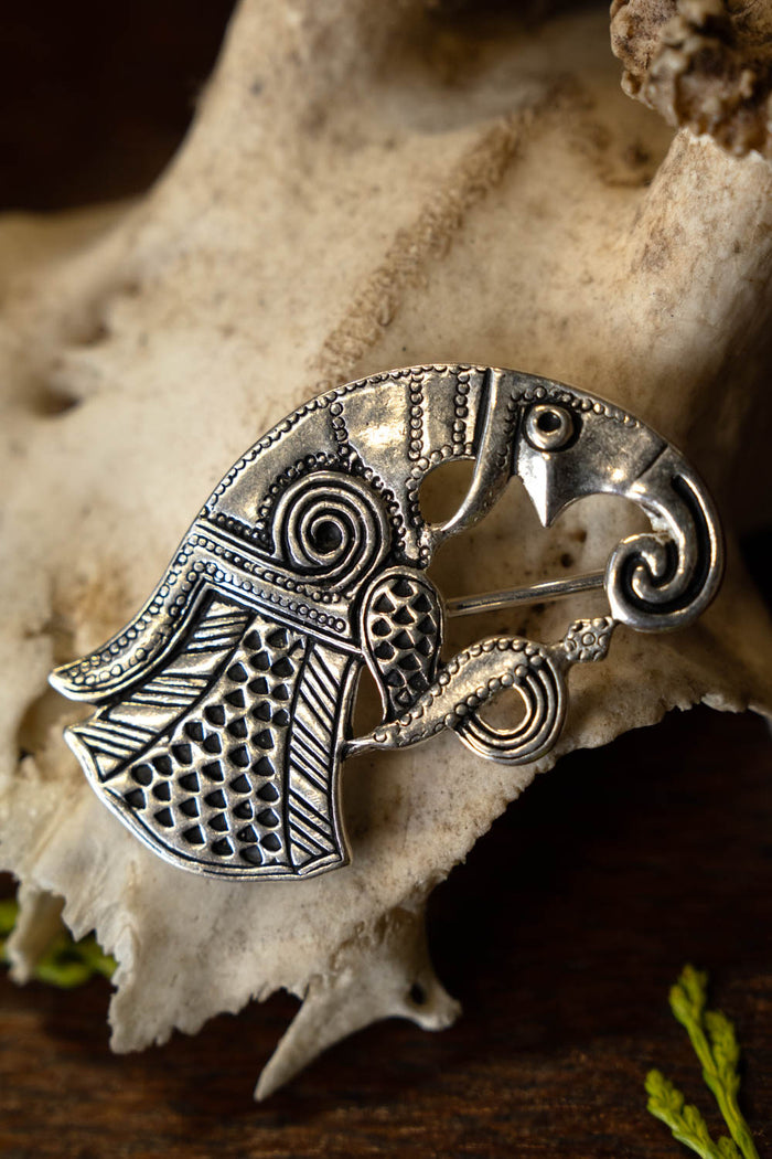 Vendel raven brooch Gotland, right-facing, silvered bronze