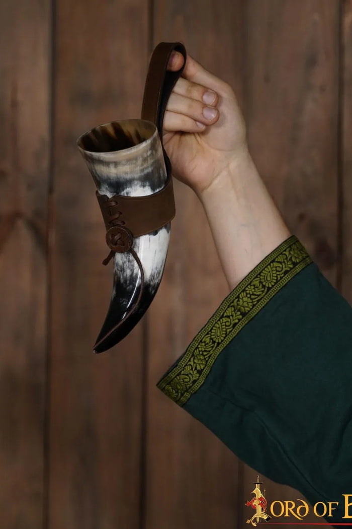 Natural drinking horn with leather holder