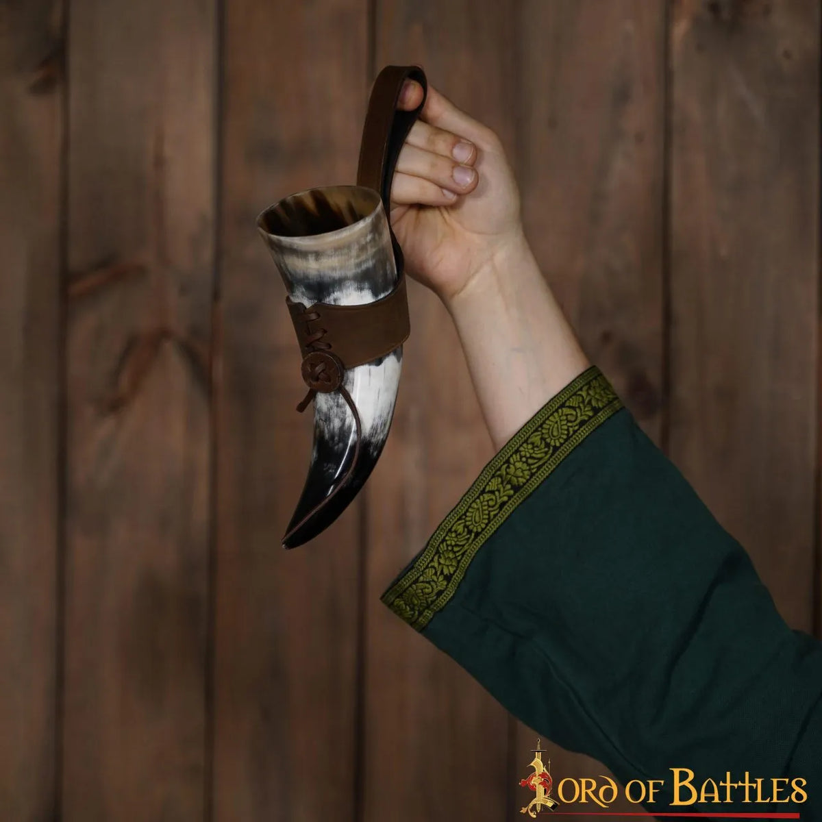 Natural drinking horn with leather holder