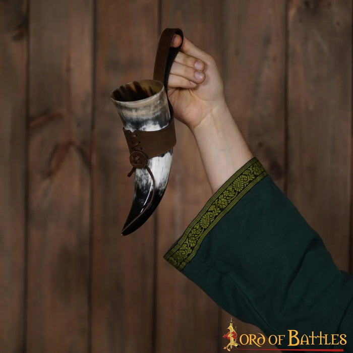 Natural drinking horn with leather holder