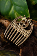 Bronze Age comb with sunwheel, bronze