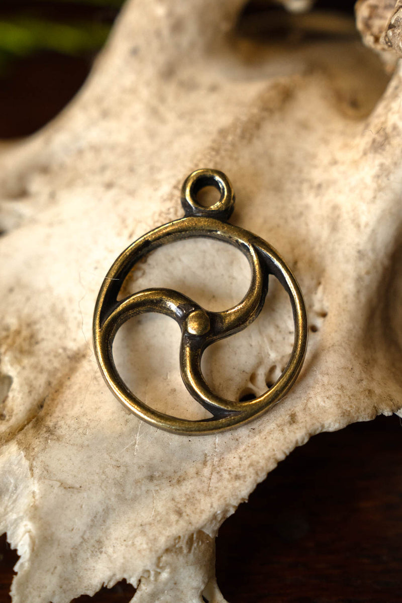 Celtic sun amulet, bronze