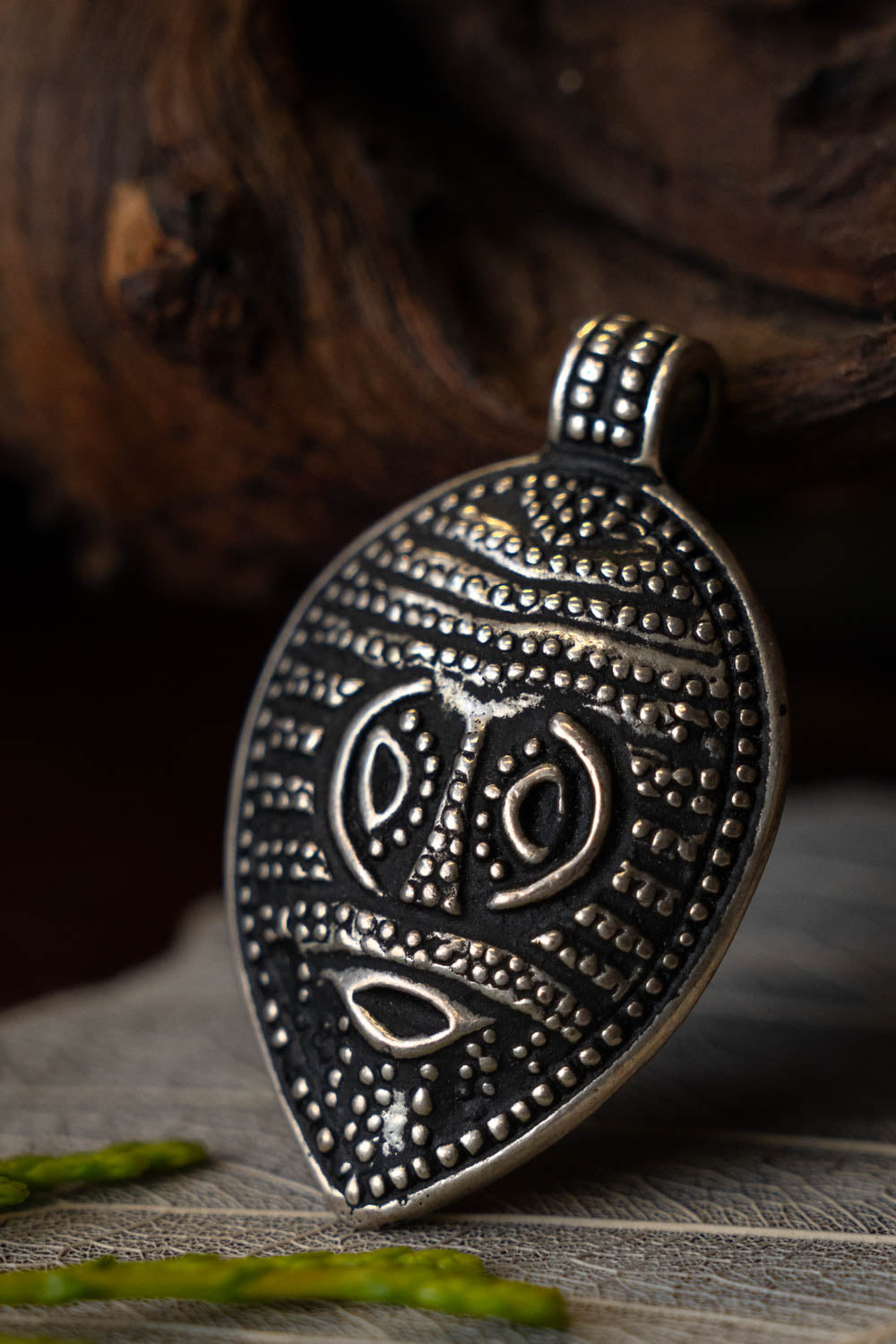 Viking Odin mask amulet Gotland, silvered bronze