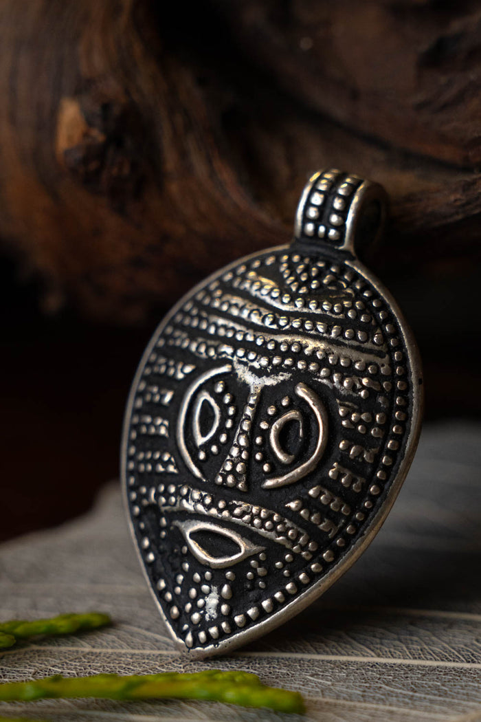 Viking Odin mask amulet Gotland, silvered bronze