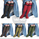 Middeleeuwse damekousen in vijf kleuren, waaronder zwart