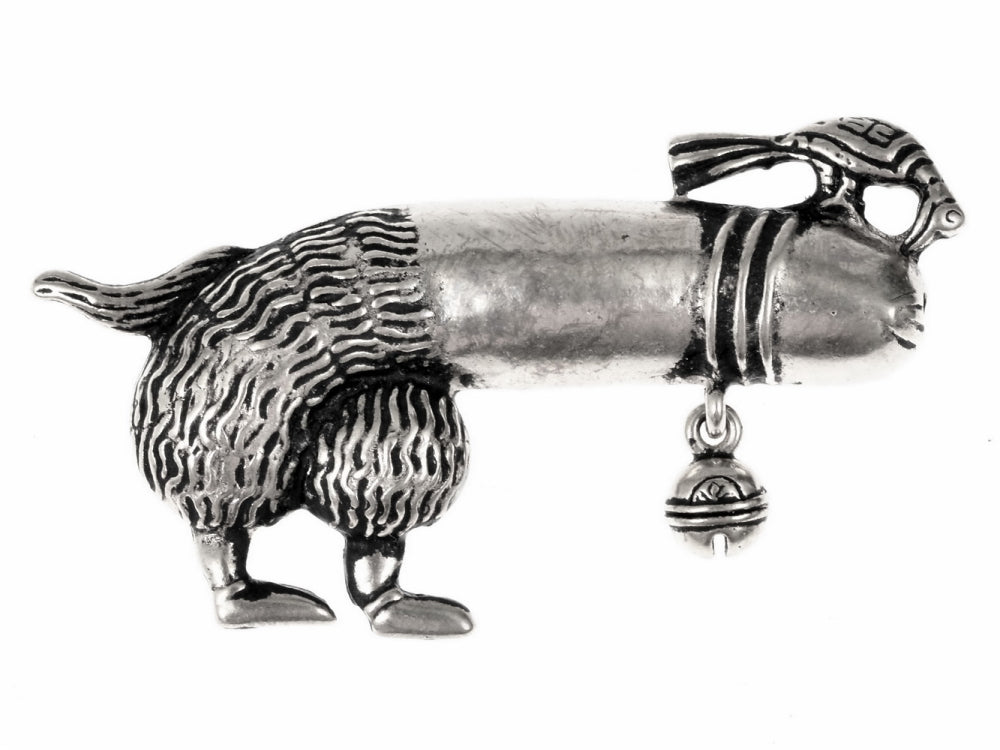 Pilgrim stitch figure with bird and bell, 15th century, silvered bronze
