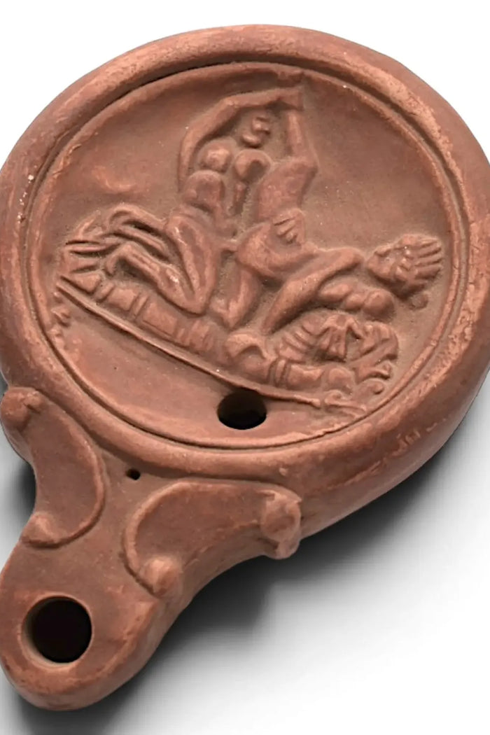 Roman oil lamp with erotic motif, Pompeii style