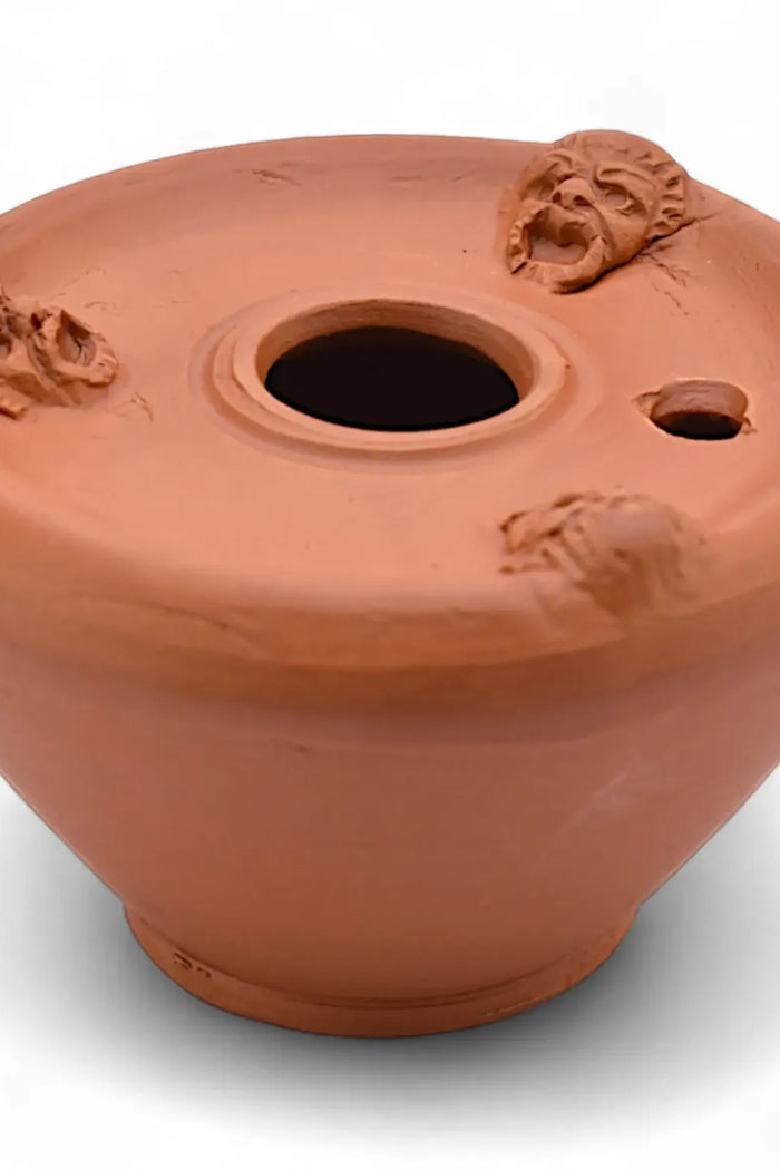 Roman inkwell with theater masks
