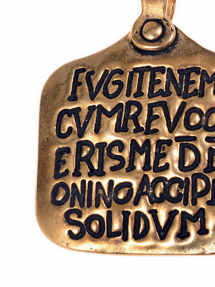 Roman slave pendant (Zoninus collar), 4th century, silvered bronze