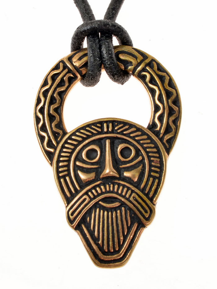 Woden head amulet Kingsworthy, 7th century, bronze